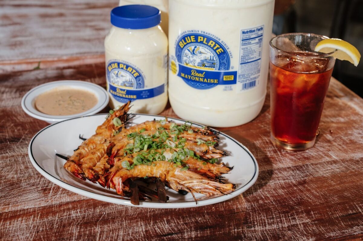 Bayou BBQ Shrimp made with Blue Plate Mayo, with bottles and jars of Blue Plate in background